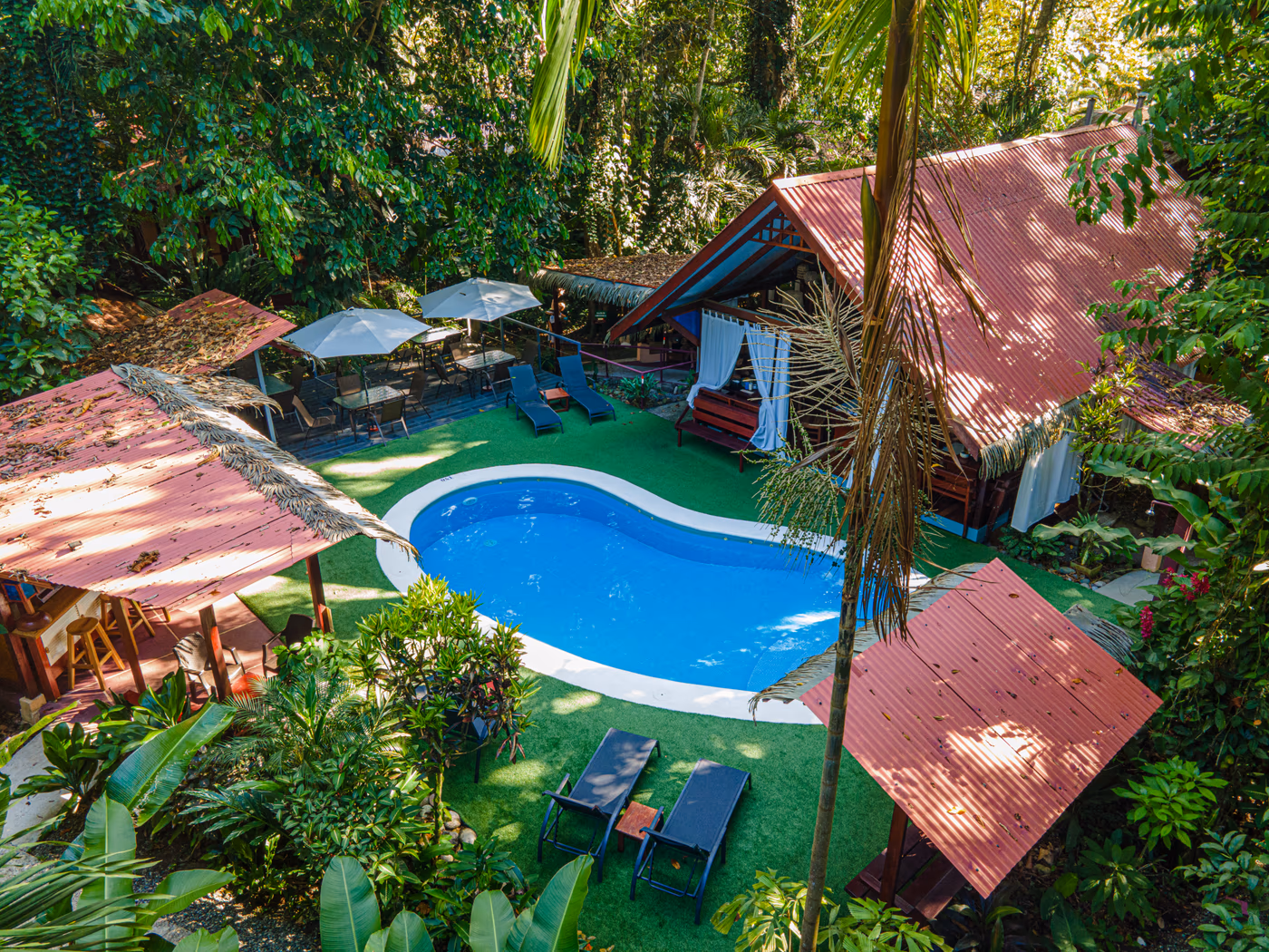 Aerial view of Namuwoki Lodge surrounded by rainforest — Caribbean eco resort in Playa Chiquita, Costa Rica